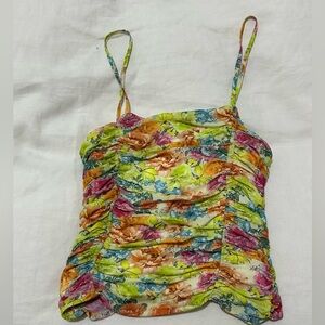 The cutest floral tank top. Extra small and rush detail throughout.
